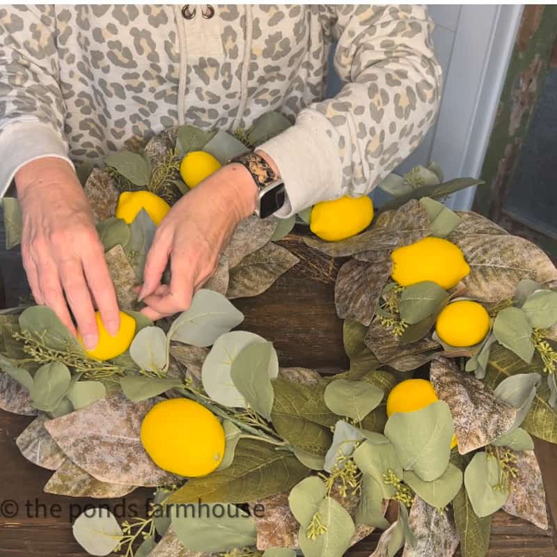 Adding lemons to the DIY Spring Wreath