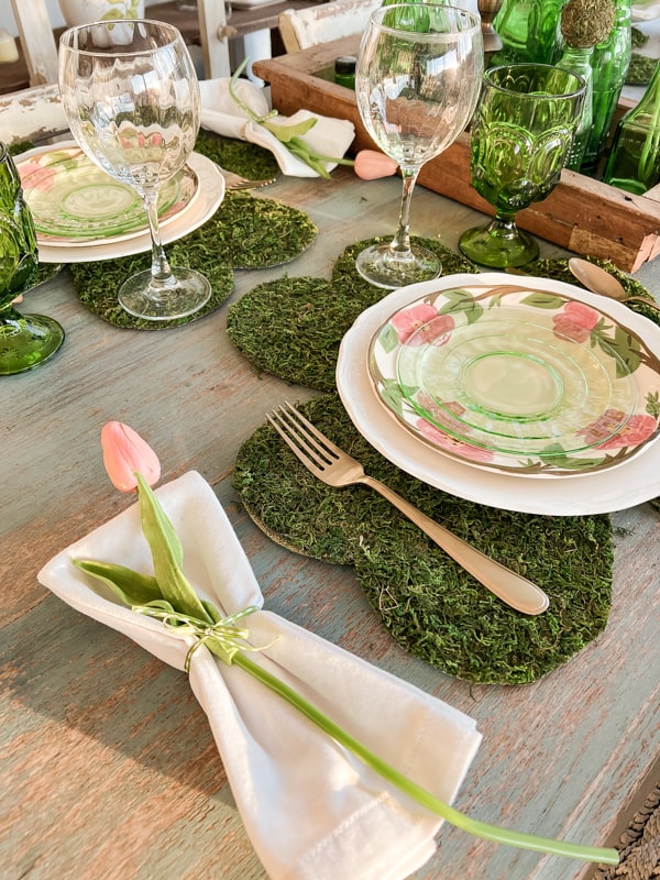 St Patrick’s Day tablescape. Moss place mats.vintage green glasses. Pink and Green St. Patty's Day Table Setting 