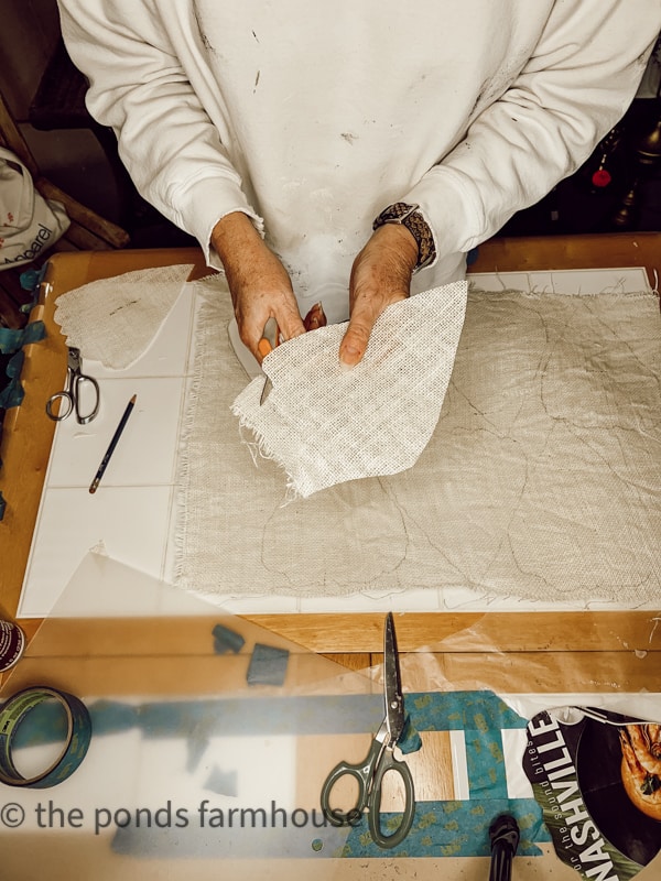 Cut petal pieces to make no-sew burlap placemats for Spring Tablescape.