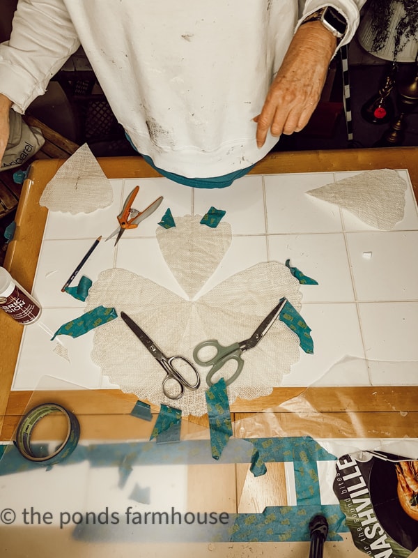 Weight the petals down until glue drys to make DIY Placemats No Sew Method.