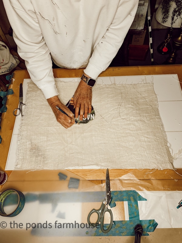 Trace the pattern onto the stiff burlap for  Easy No-Sew DIY Placemats