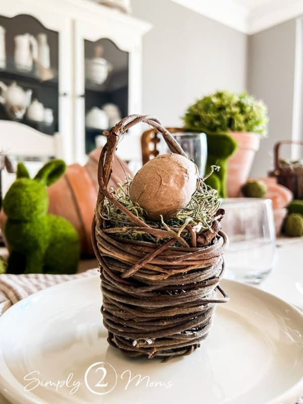 Easter Table with mini Easter baskets on each plate.  