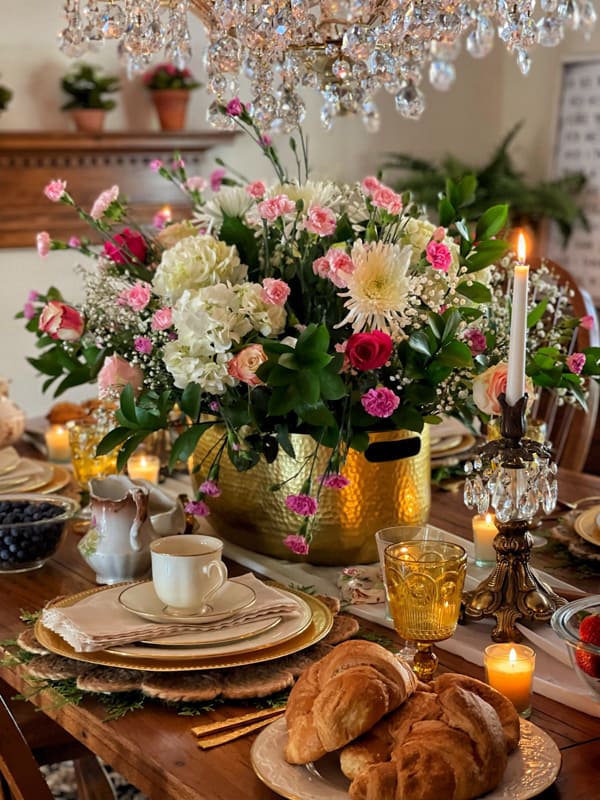 Beautiful Gold container with fresh flower arrangement centerpiece for Easter Table.  