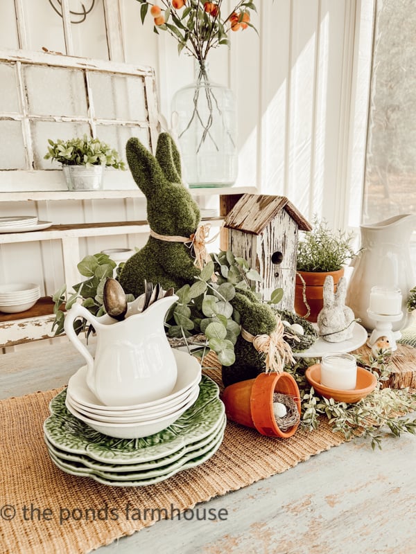 Stacked Cabbage Plates on Easter Centerpiece. Moss Easter Bunny , bird house decorations.