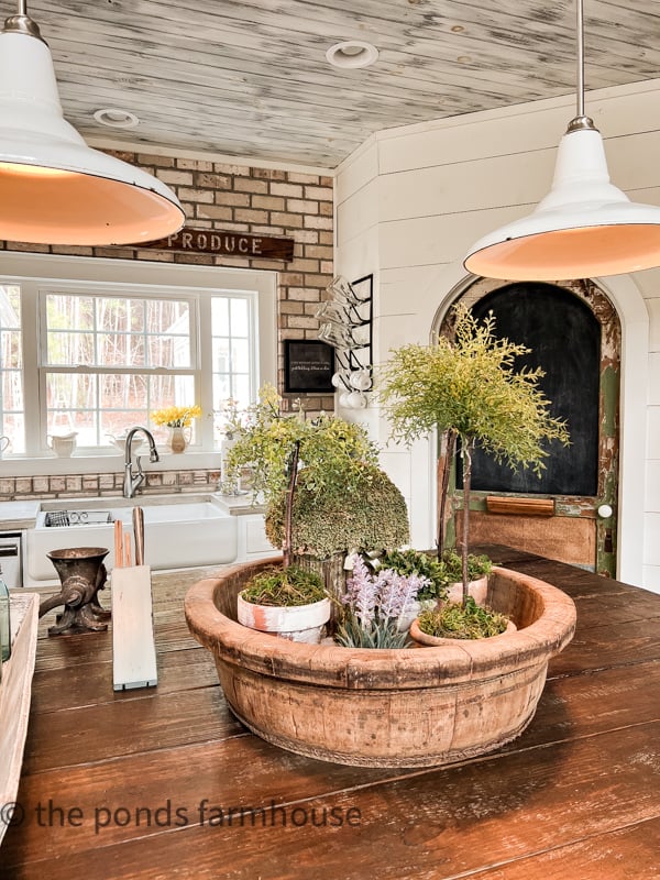 Vintage wooden bowl filled with DIY Topiaries for Farmhouse Spring Decorating Ideas