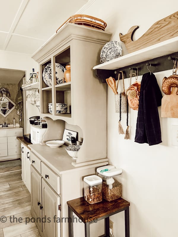 Tiny Beach House Kitchen Remodel After.  DIY Pegboard shelf and kitchen hutch.