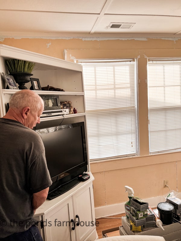 Moving previous cabinet from corner that accent wall wall will be installed.how to add an inexpensive, easy wood accent wall to your home