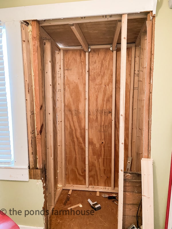 Add closet to small bedroom renovtion by replacing a window and bumping the wall out.