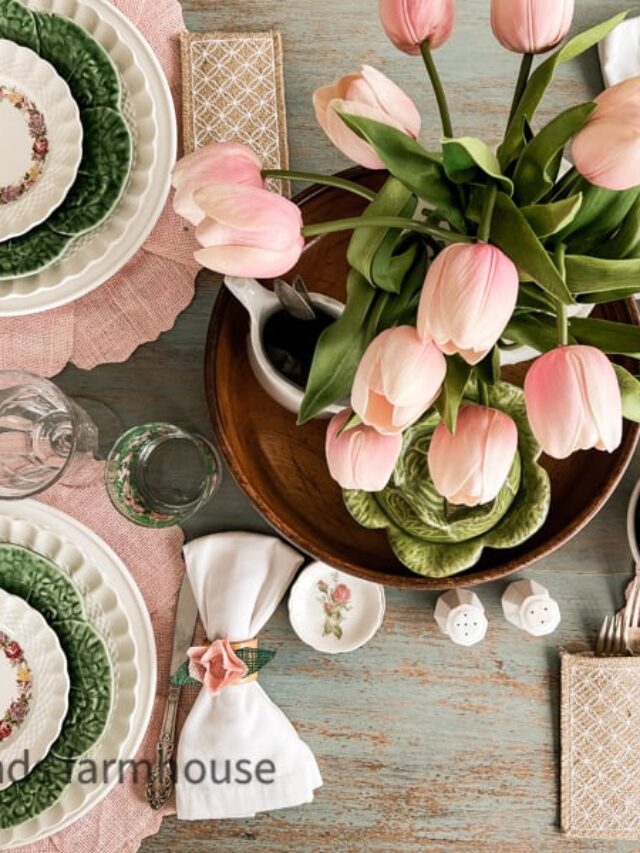 Flowers decorating a spring tablescape. Spring places and chargers.