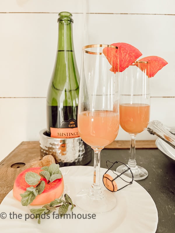 Set up a mimosa bar for guests to serve themselves.