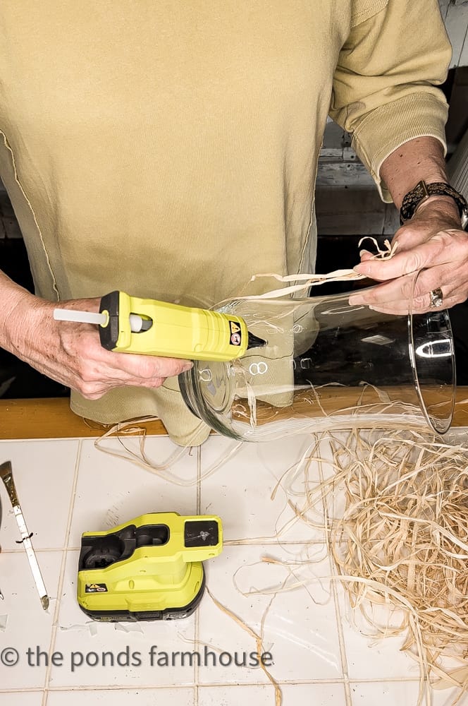 Raffia and Ryobi hot glue gun for easy diy Pottery Barn hack.