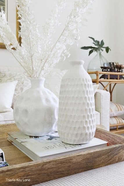 upcycled vases, white refurbished vases for upcycled decorating ideas.  