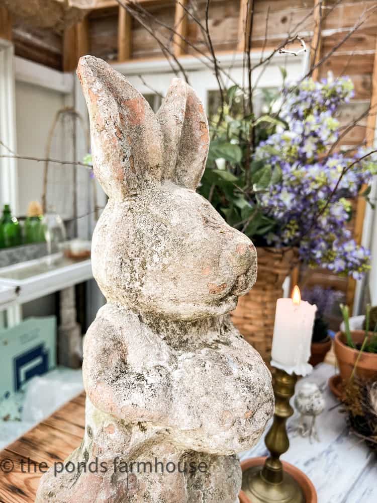 Spring Centerpiece Ideas - Spring Basket - concrete Easter bunny - greenhouse bunny