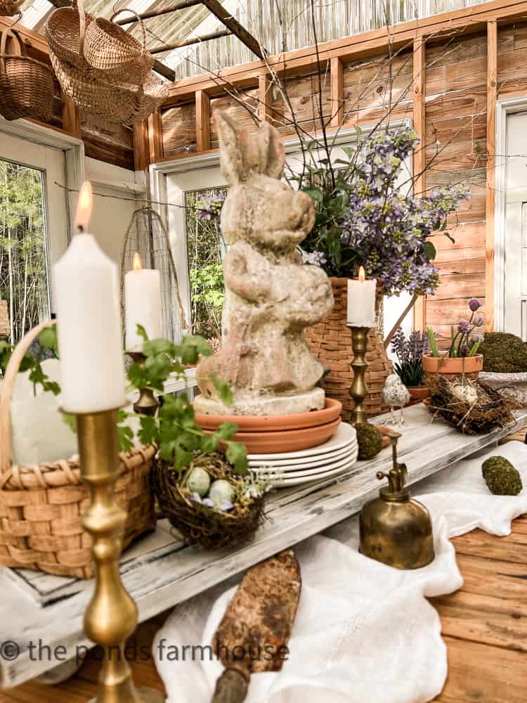 Tips for Spring Centerpiece with wooden riser, bunny statuary and basket floral arrangement.