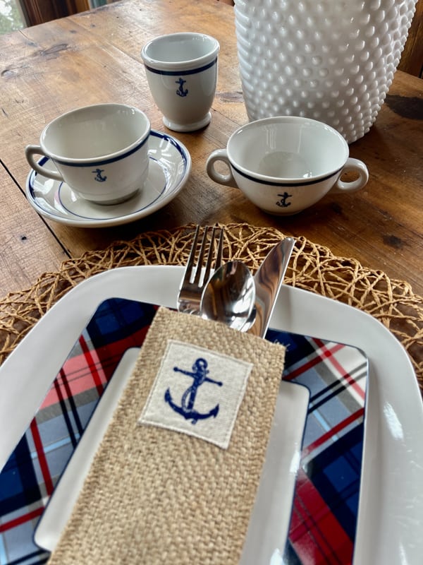 Vintage Lake inspired spring tablescape with nautical theme.