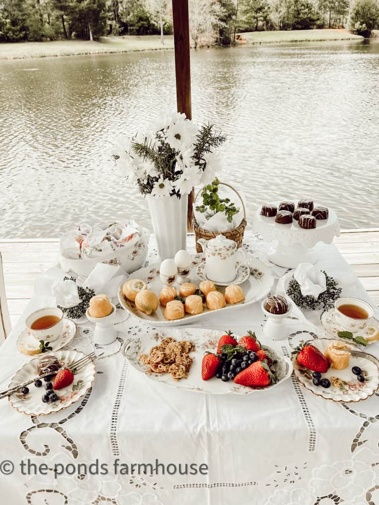 Tea Party Idea for A spring tablescape on the pier with vintage dishes.