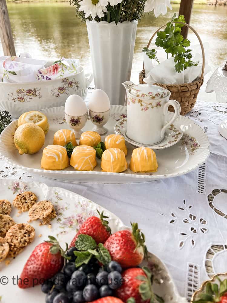 Fruit and sweets on the menu - tea party by the water. Lite finger foods