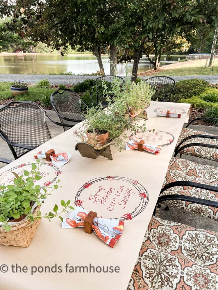 outdoor table setting for alfresco dining. Homemade table cloth, homemade table runner for shrimp or frogmore stew dinner