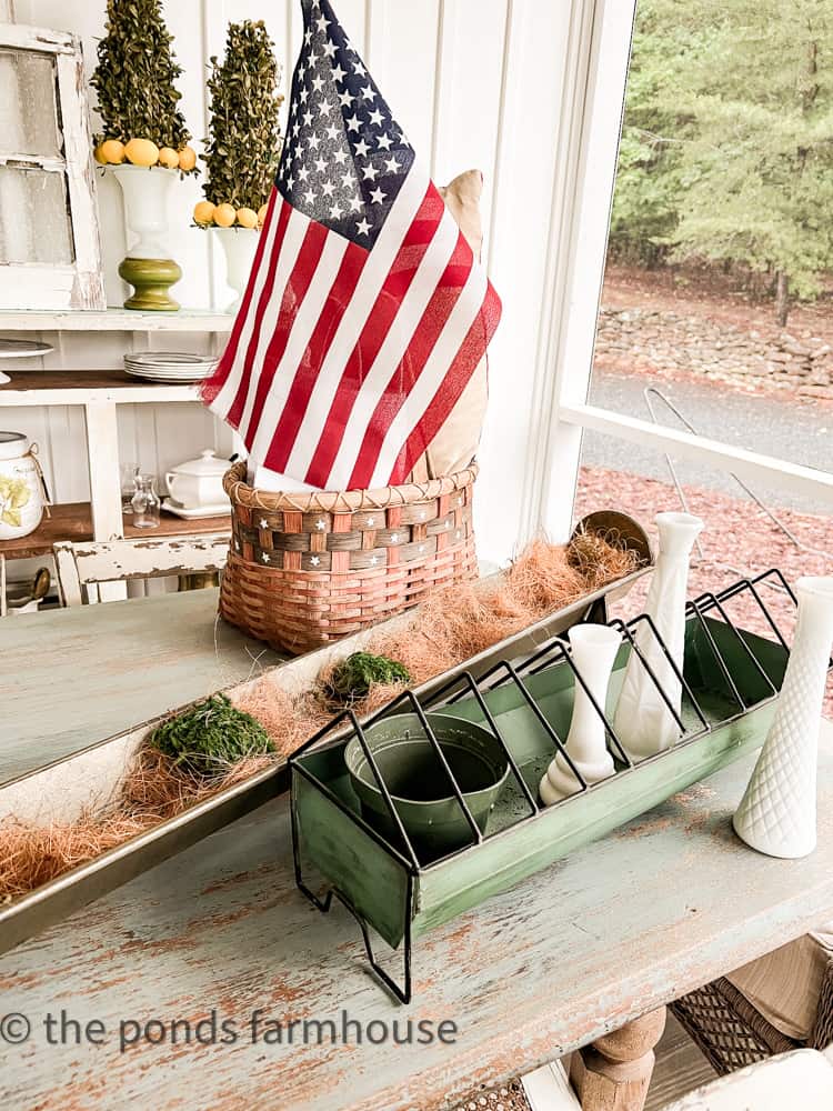 vintage milk glass vases are used to create a fresh herb centerpiece for free decorating.  