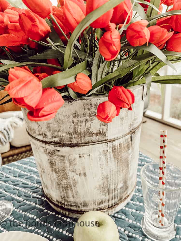 Ice Creme Churn turned floral arrangement.