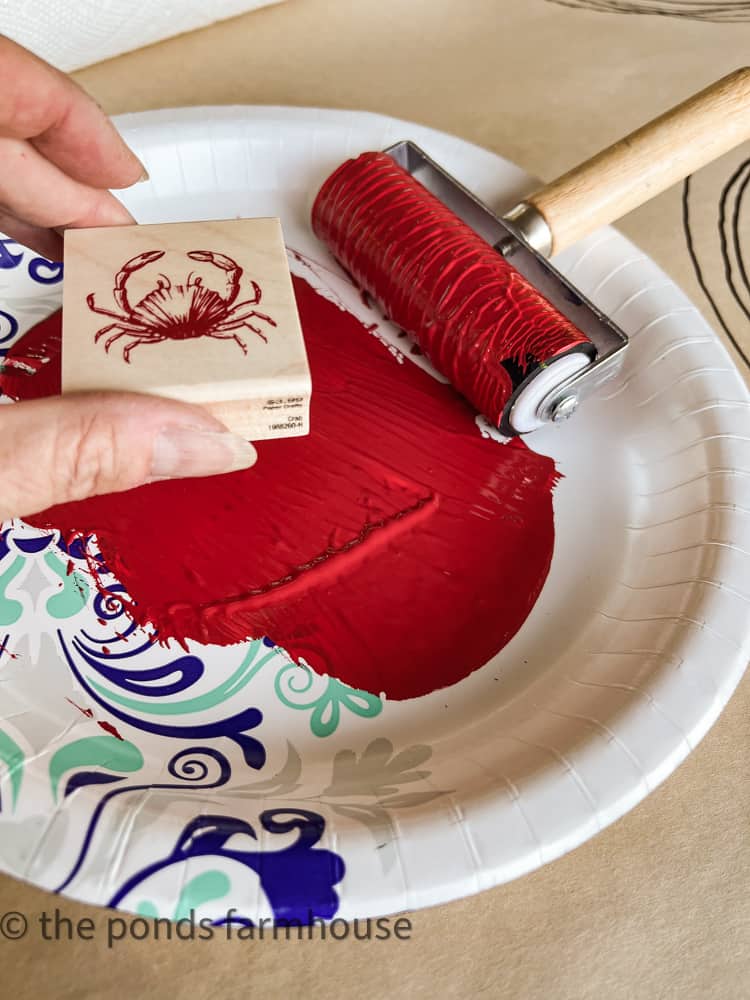 Use paint, stamps and sharpies to create the diy kraft paper tablecloth you desire.  