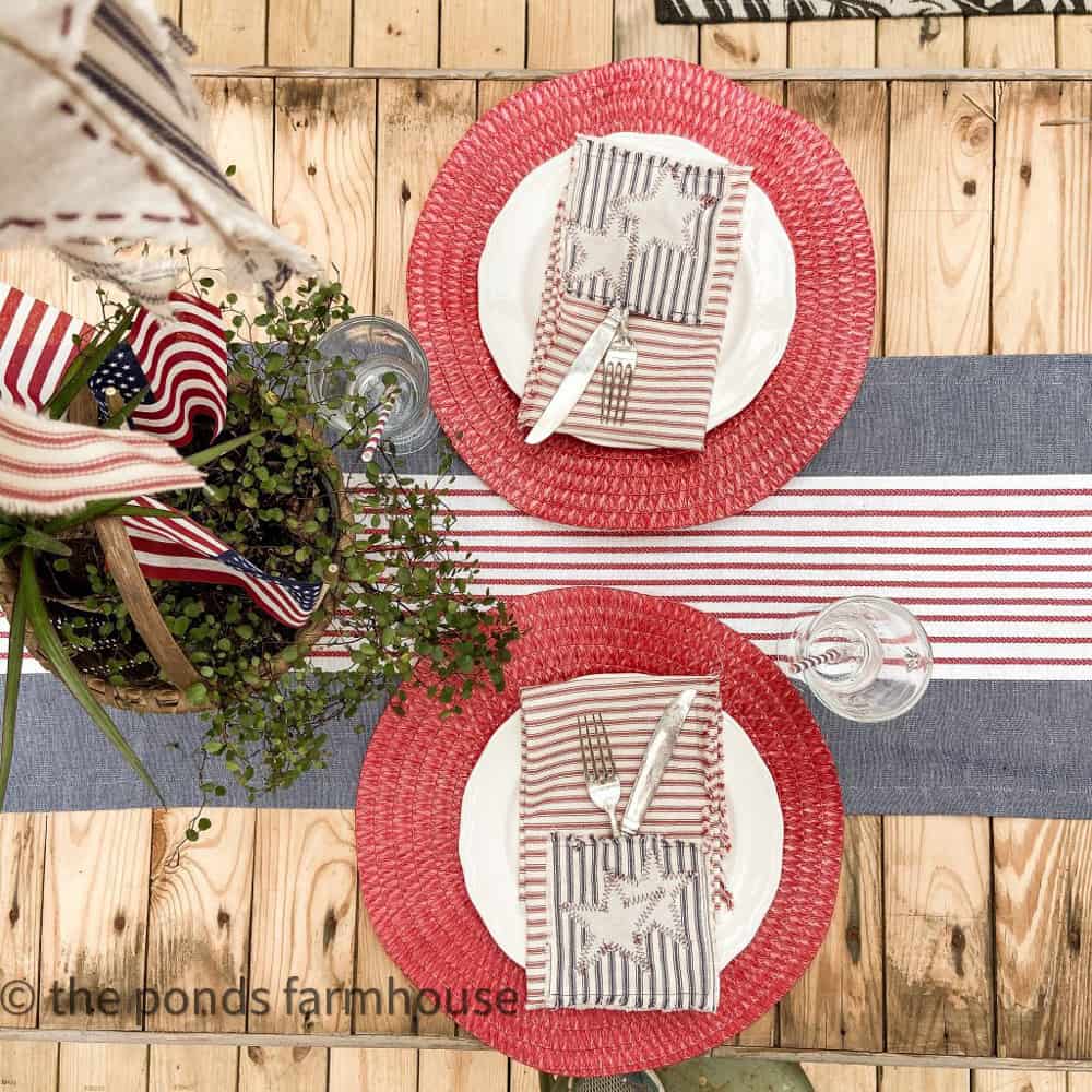DIY Ticking Strip Patriotic napkins with cutlery pockets for 4th of July decorating on a budget.