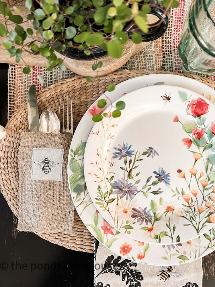 Spring Tablescapes with cutlery pockets in burlap with bees.  
