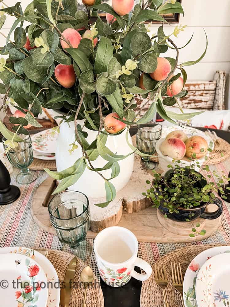 Spring Centerpiece for Tablescape ideas with peach stems in a vintage ironstone vase container.