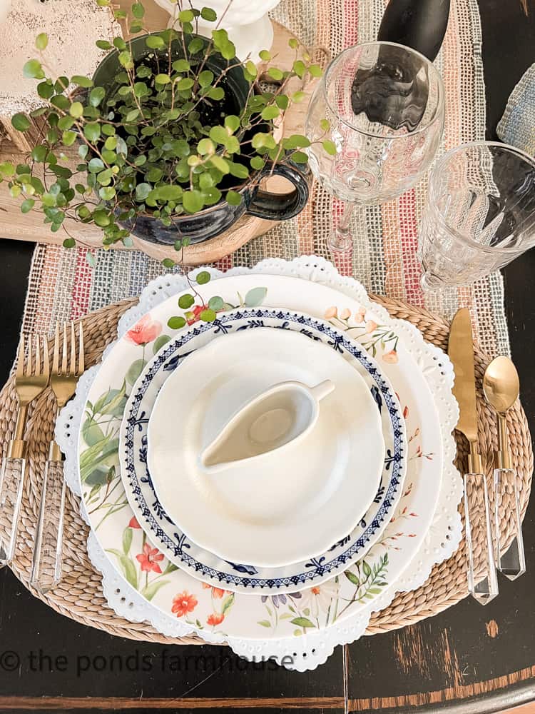 Mixing dish patterns is an acceptable method of setting a dinner table.  