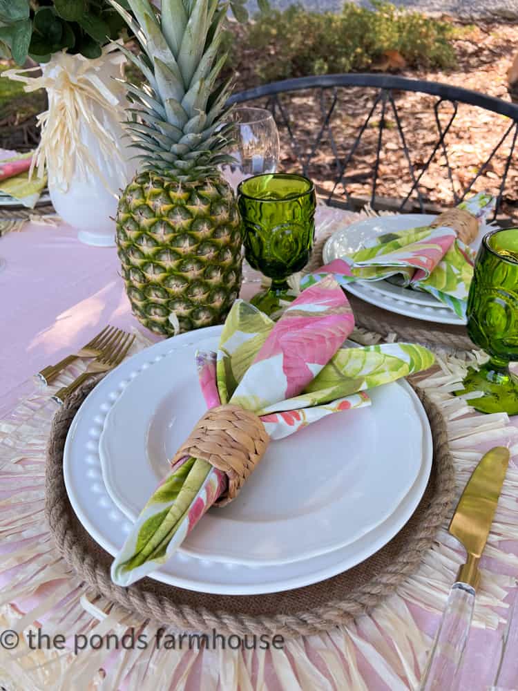Floral napkins with woven napkin rings inspired table setting for Budget Luau Tabblescape