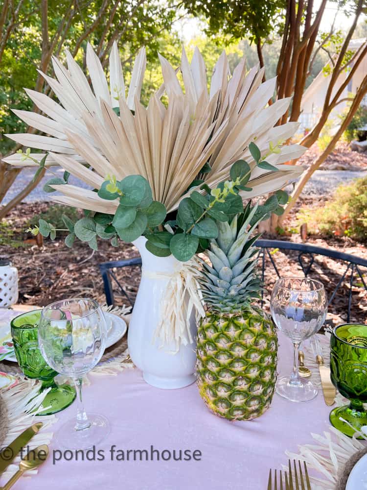 Luau Party Ideas centerpiece with pineapple and dried palms Hawaiian Centerpiece with budget Luau Table Decor.