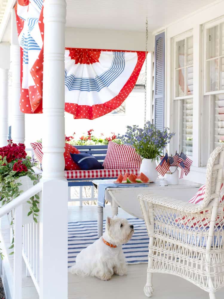 Patriotic porch, patriotic flag, cute dogs. Independence Day porch decorations . Patriotic porch swing