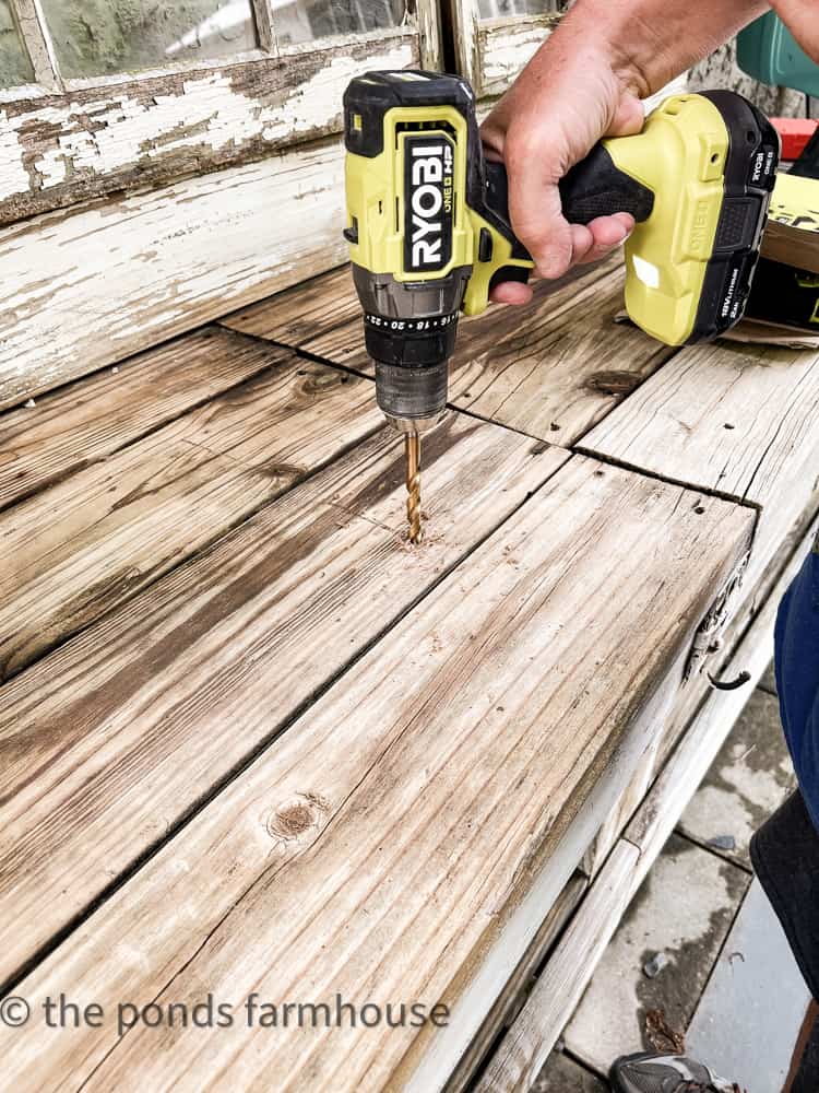 Drill holes in wooden top, diy potting bench using Ryobi tools