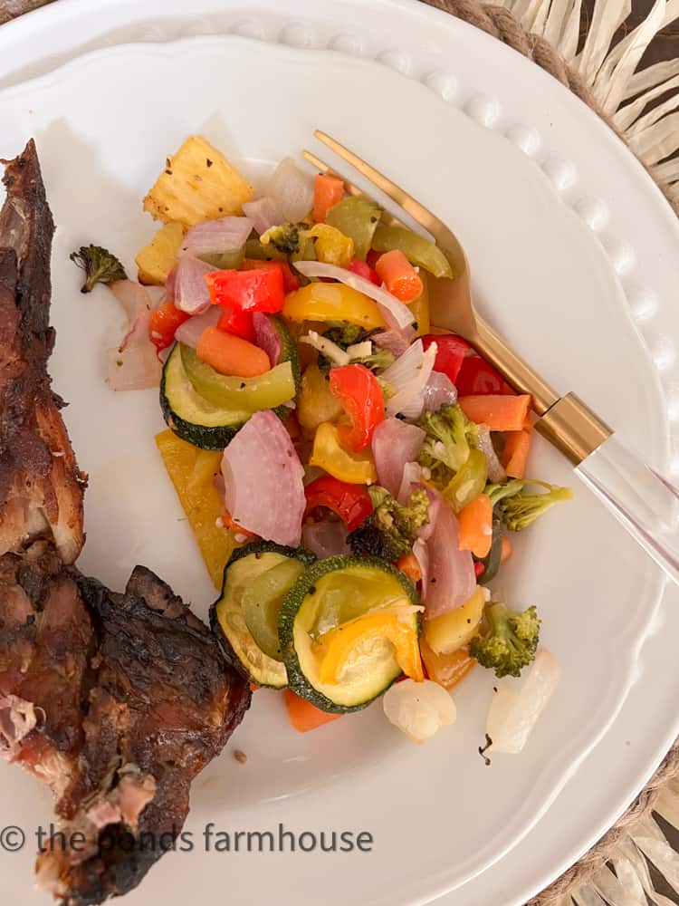 Delicious side dish for meat - roasted vegetable recipe. Roasted vegetables with bbq ribs.