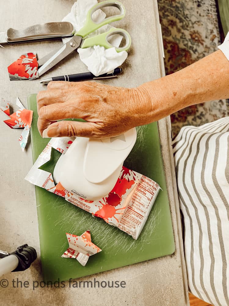 Use star punch to make patriotic eco-friendly garland for 4th of July