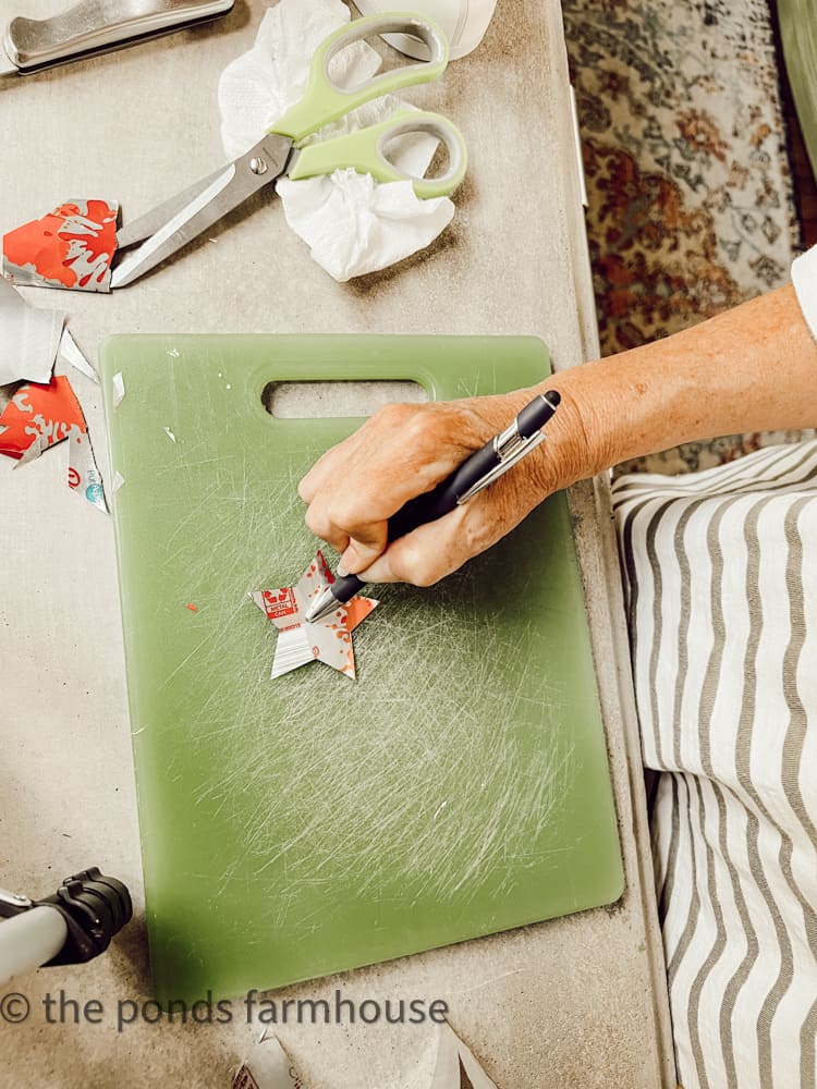 crease stars to make patriotic garland for fourth of July