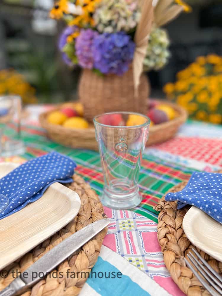 Bee water glasses on vintage quilt for backyard bbq table setting and outdoor grilling ideas for outdoor B B Q 