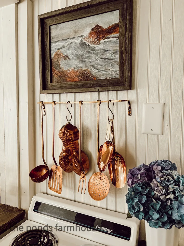 Add nautical coppers and brass to coastal home decor ideas and a nautical feel