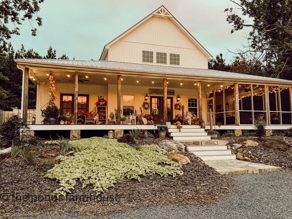 White Farmhouse decorated for Fall 