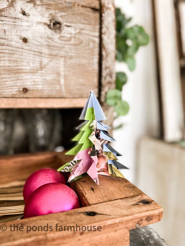 Make paper Christmas Trees from old magazine pages for a fun recycled craft, garland or ornament.