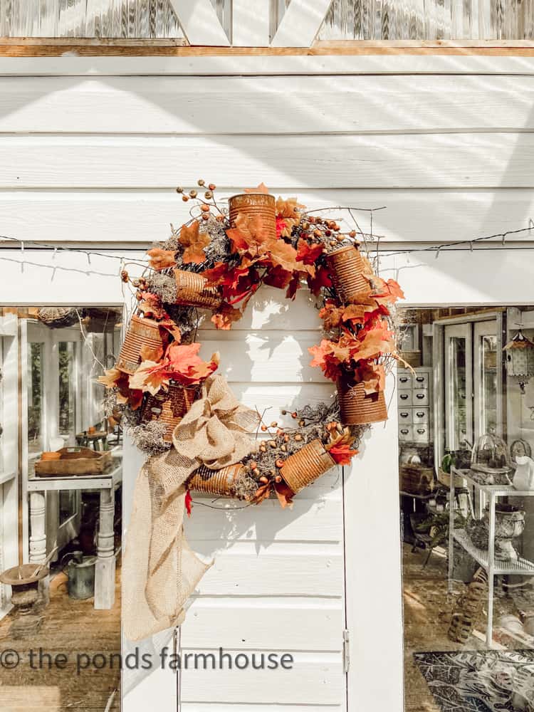 Rusty tin can wreath for DIY Eco-Friendly Decor project.  Recycled Decor Ideas for Fall