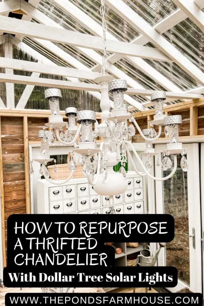 vintage chandelier repurposed into a greenhouse solar light.