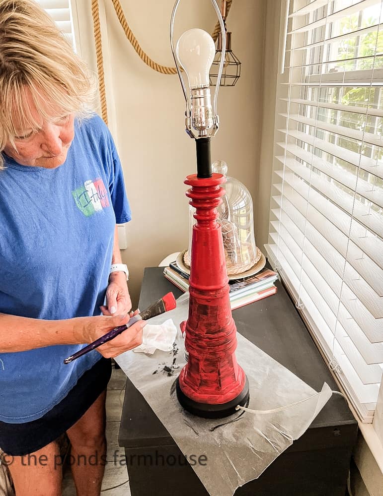 Paint lamp base red with chalk paint for a coastal lamp makeover and repurposed transformation. 