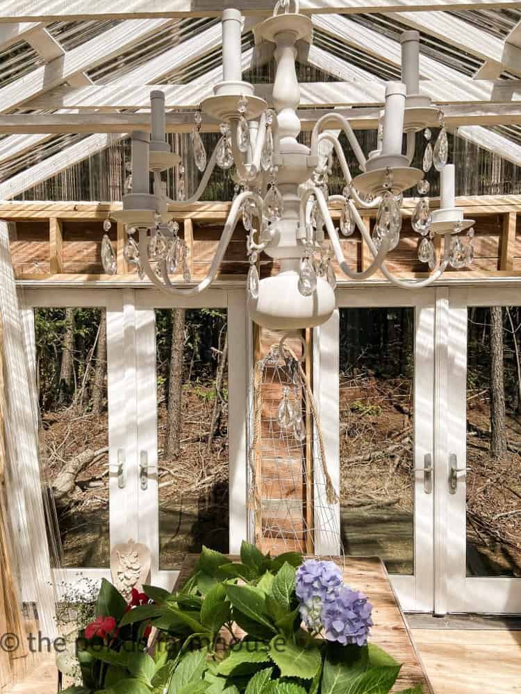 Hang the Repurposed Thrift Store Vintage Chandelier in Greenhouse with added vintage crystals.