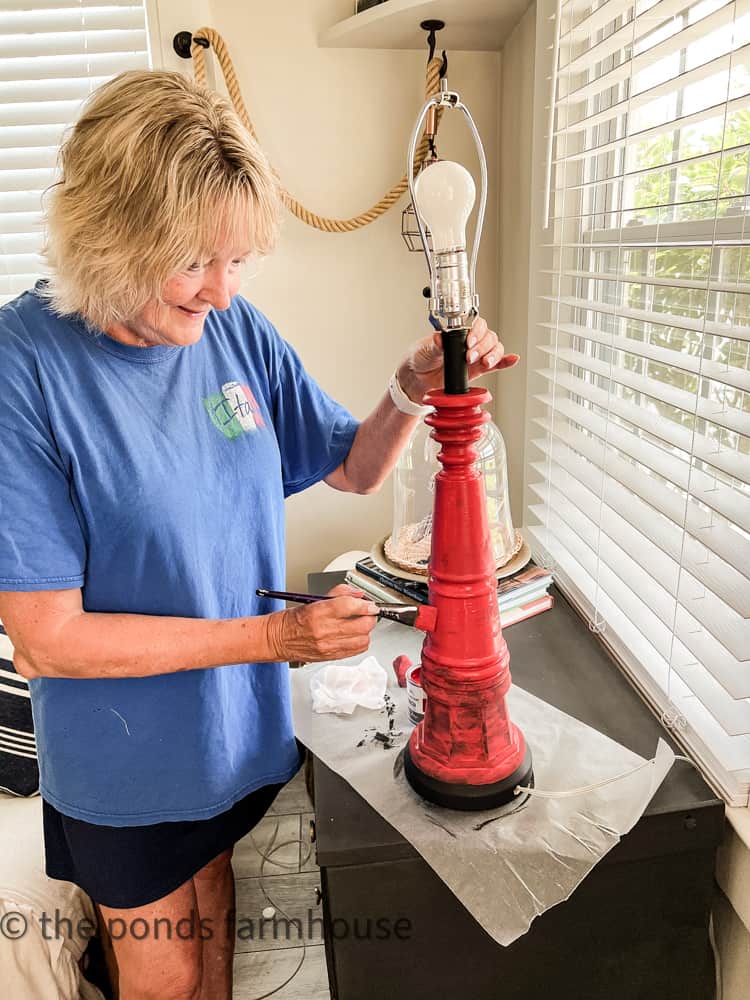 Paint lamp base red with chalk paint for a coastal lamp makeover and repurposed transformation.  