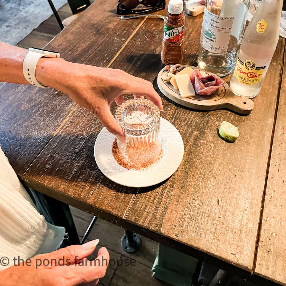 Rim cocktail glass with tajin or salt for a delicious tasting Ranch Water Recipe.  