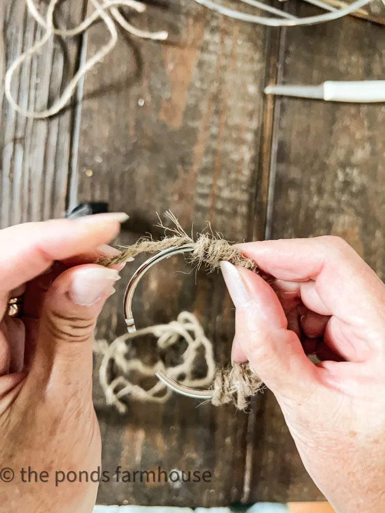 wrap jute rope around binder rings to make DIY napkin Rings.  