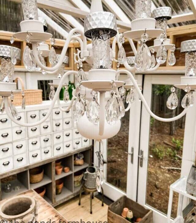cropped-Close-up-of-chandelier-with-Dollar-Tree-Solar-Lights-Repurposed-Thrift-Store-Chandelier-hanging-in-the-Greenhouse-1.jpg