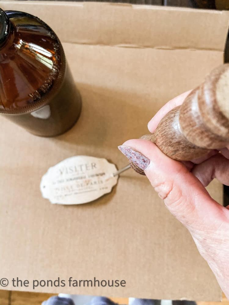 Punch hole in label to tie around old bottles.