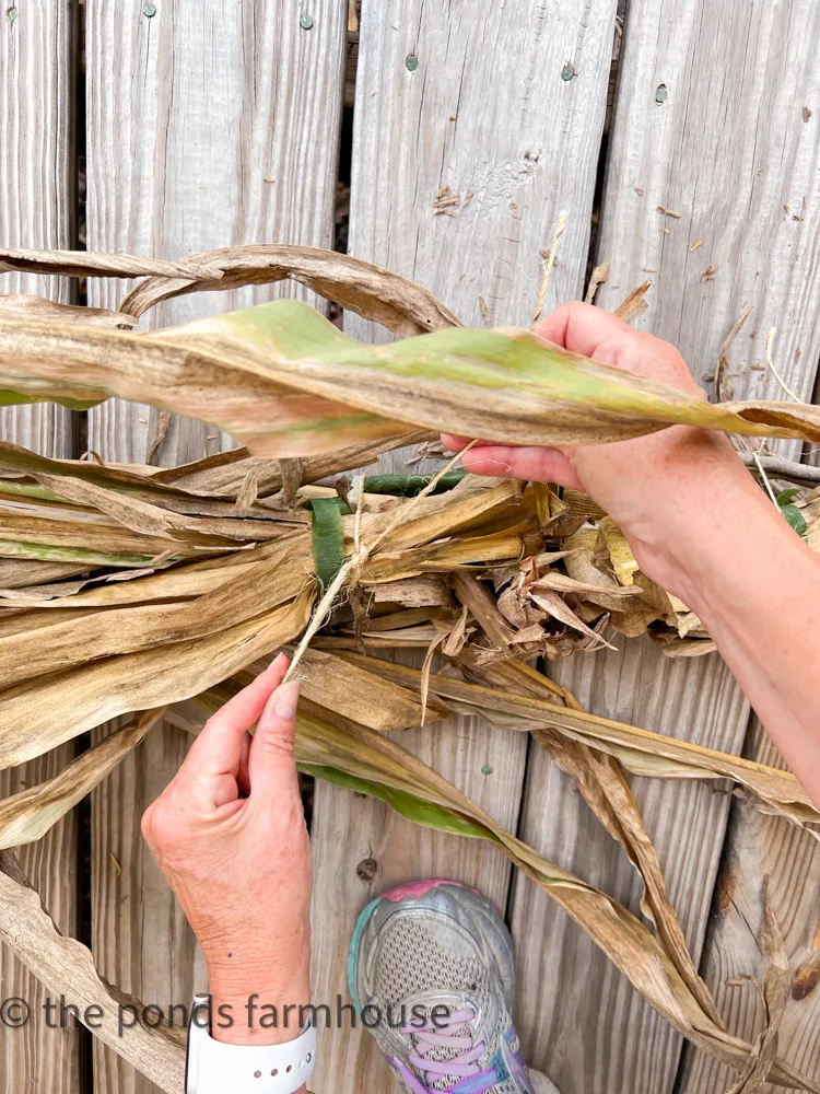 Assemble corn stalks to make a farmhouse style garland for front porches or doorways